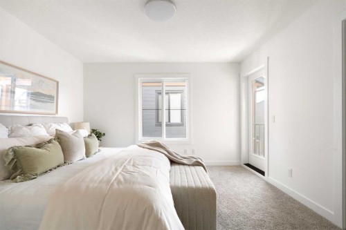 304-255 Rowmont Boulevard Nw, Calgary, AB - Indoor Photo Showing Bedroom