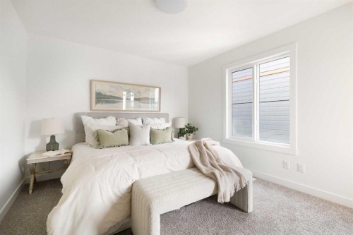 304-255 Rowmont Boulevard Nw, Calgary, AB - Indoor Photo Showing Bedroom