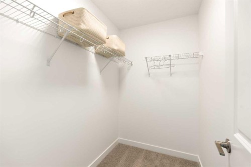 304-255 Rowmont Boulevard Nw, Calgary, AB - Indoor With Storage