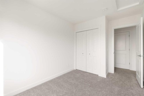304-255 Rowmont Boulevard Nw, Calgary, AB - Indoor Photo Showing Other Room