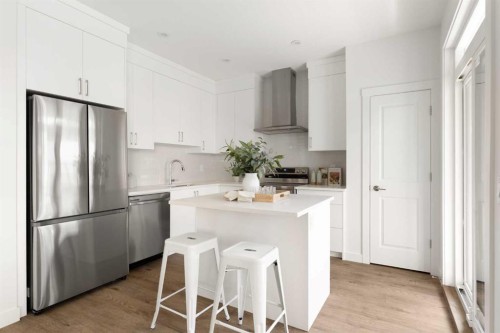 304-255 Rowmont Boulevard Nw, Calgary, AB - Indoor Photo Showing Kitchen