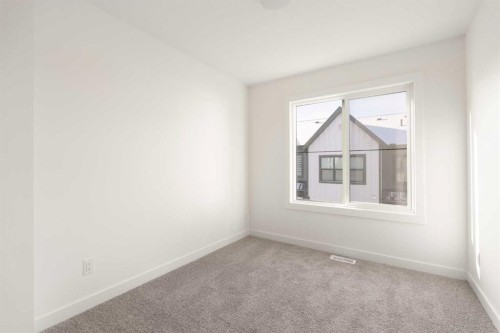 304-255 Rowmont Boulevard Nw, Calgary, AB - Indoor Photo Showing Other Room