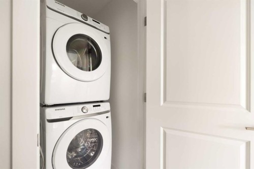 304-255 Rowmont Boulevard Nw, Calgary, AB - Indoor Photo Showing Laundry Room
