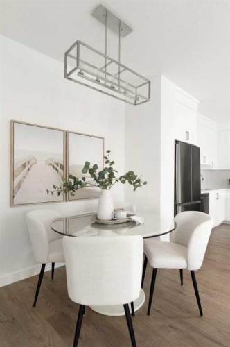 304-255 Rowmont Boulevard Nw, Calgary, AB - Indoor Photo Showing Dining Room
