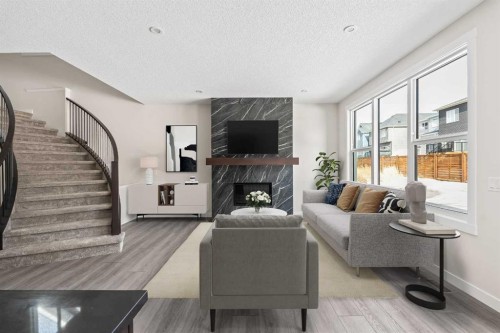 506 Lucas Way Nw, Calgary, AB - Indoor Photo Showing Living Room With Fireplace