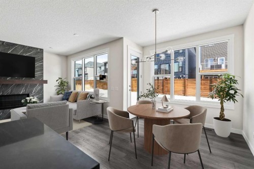 506 Lucas Way Nw, Calgary, AB - Indoor With Fireplace