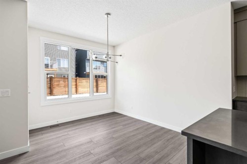 506 Lucas Way Nw, Calgary, AB - Indoor Photo Showing Other Room