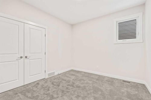 506 Lucas Way Nw, Calgary, AB - Indoor Photo Showing Other Room