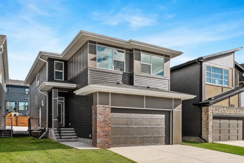 506 Lucas Way Nw, Calgary, AB - Outdoor With Facade