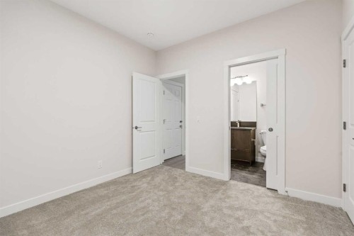 506 Lucas Way Nw, Calgary, AB - Indoor Photo Showing Other Room