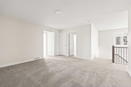 506 Lucas Way Nw, Calgary, AB - Indoor Photo Showing Other Room