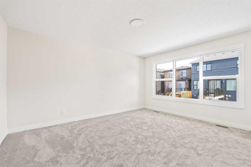 506 Lucas Way Nw, Calgary, AB - Indoor Photo Showing Other Room