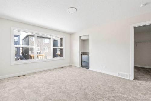 506 Lucas Way Nw, Calgary, AB - Indoor Photo Showing Other Room