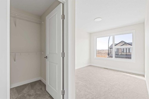 506 Lucas Way Nw, Calgary, AB - Indoor Photo Showing Other Room