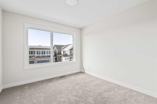 506 Lucas Way Nw, Calgary, AB - Indoor Photo Showing Other Room