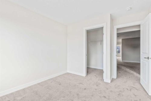 506 Lucas Way Nw, Calgary, AB - Indoor Photo Showing Other Room