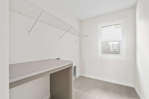 506 Lucas Way Nw, Calgary, AB - Indoor With Storage