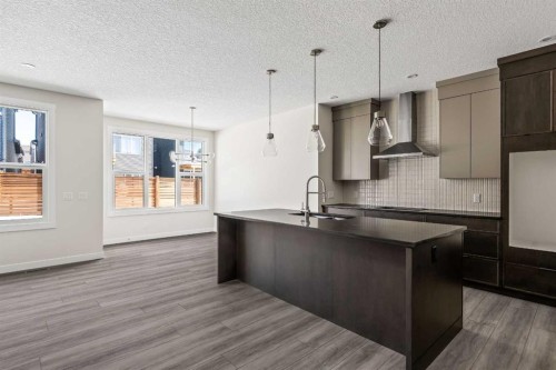 506 Lucas Way Nw, Calgary, AB - Indoor Photo Showing Kitchen With Upgraded Kitchen