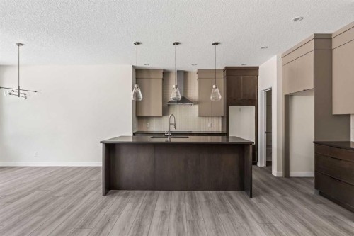 506 Lucas Way Nw, Calgary, AB - Indoor Photo Showing Kitchen With Upgraded Kitchen