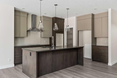 506 Lucas Way Nw, Calgary, AB - Indoor Photo Showing Kitchen With Upgraded Kitchen
