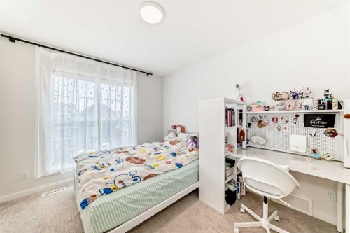 164 Magnolia Terrace Se, Calgary, AB - Indoor Photo Showing Bedroom