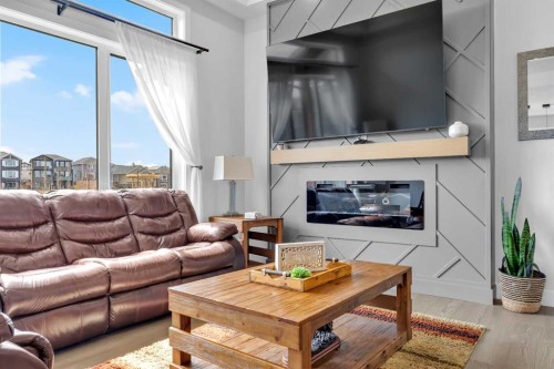 25 Cimarron Estates Gate, Okotoks, AB - Indoor Photo Showing Living Room