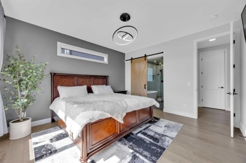 25 Cimarron Estates Gate, Okotoks, AB - Indoor Photo Showing Bedroom
