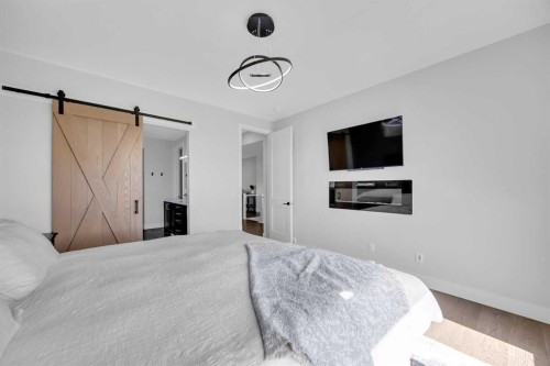 25 Cimarron Estates Gate, Okotoks, AB - Indoor Photo Showing Bedroom