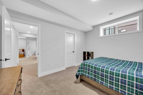 25 Cimarron Estates Gate, Okotoks, AB - Indoor Photo Showing Bedroom