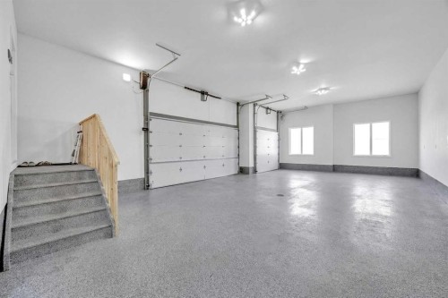 25 Cimarron Estates Gate, Okotoks, AB - Indoor Photo Showing Garage