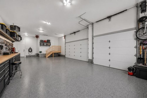 25 Cimarron Estates Gate, Okotoks, AB - Indoor Photo Showing Garage
