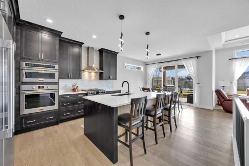 25 Cimarron Estates Gate, Okotoks, AB - Indoor Photo Showing Kitchen With Upgraded Kitchen