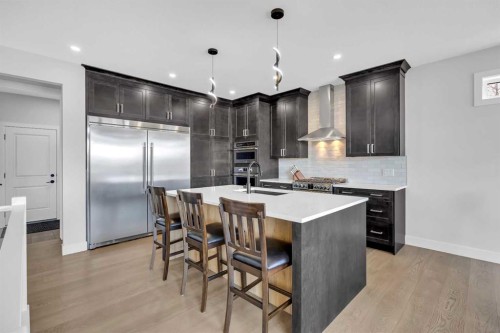 25 Cimarron Estates Gate, Okotoks, AB - Indoor Photo Showing Kitchen With Upgraded Kitchen