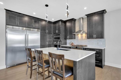 25 Cimarron Estates Gate, Okotoks, AB - Indoor Photo Showing Kitchen With Upgraded Kitchen