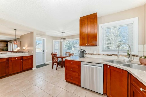 127 Mckerrell Way Se, Calgary, AB - Indoor Photo Showing Kitchen With Double Sink