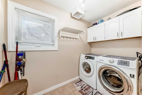 127 Mckerrell Way Se, Calgary, AB - Indoor Photo Showing Laundry Room