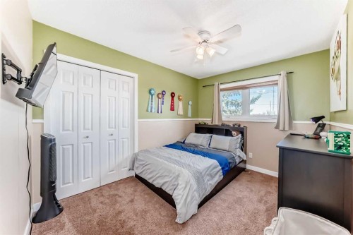 127 Mckerrell Way Se, Calgary, AB - Indoor Photo Showing Bedroom
