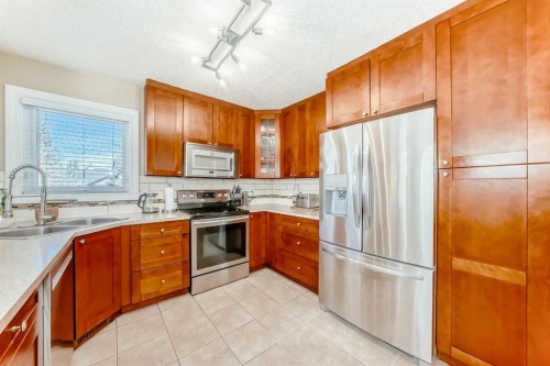 127 Mckerrell Way Se, Calgary, AB - Indoor Photo Showing Kitchen With Stainless Steel Kitchen With Double Sink