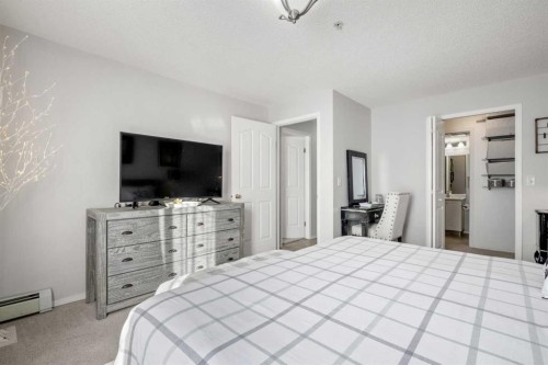 1208 Millrise Point Sw, Calgary, AB - Indoor Photo Showing Bedroom