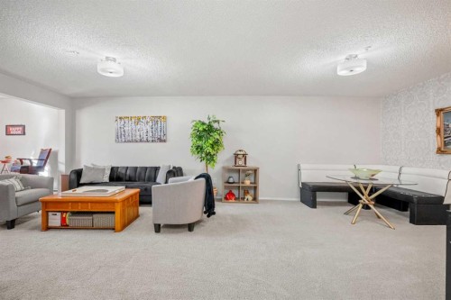 1208 Millrise Point Sw, Calgary, AB - Indoor Photo Showing Living Room
