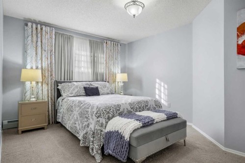 1208 Millrise Point Sw, Calgary, AB - Indoor Photo Showing Bedroom