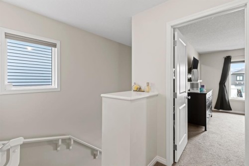27 Heritage Rise, Cochrane, AB - Indoor Photo Showing Other Room