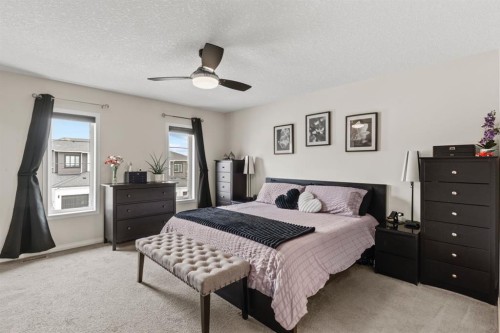 27 Heritage Rise, Cochrane, AB - Indoor Photo Showing Bedroom
