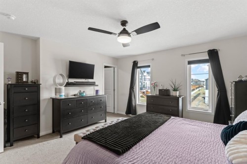 27 Heritage Rise, Cochrane, AB - Indoor Photo Showing Bedroom