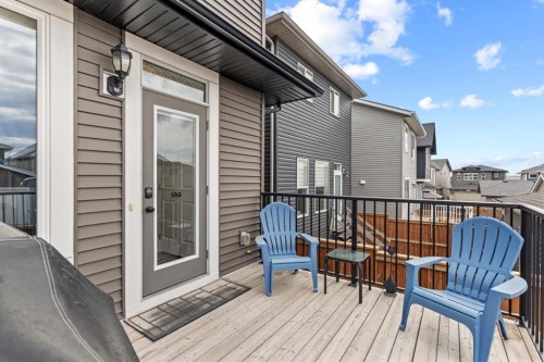 27 Heritage Rise, Cochrane, AB - Outdoor With Deck Patio Veranda With Exterior