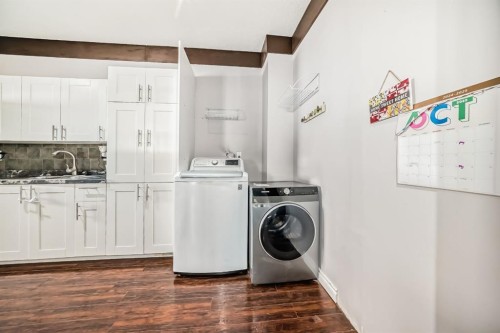 724D Raynard Crescent Se, Calgary, AB - Indoor Photo Showing Laundry Room