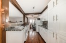 724D Raynard Crescent Se, Calgary, AB  - Indoor Photo Showing Kitchen With Double Sink 