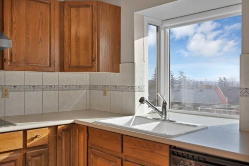 68 Hawkfield Crescent Nw, Calgary, AB - Indoor Photo Showing Kitchen With Double Sink