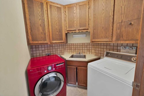 68 Hawkfield Crescent Nw, Calgary, AB - Indoor Photo Showing Laundry Room