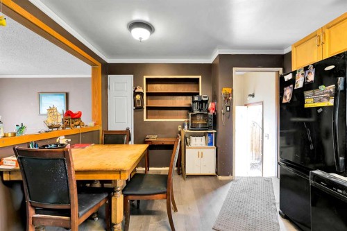 924 Hunterston Hill Nw, Calgary, AB - Indoor Photo Showing Dining Room